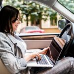 Busy student learning online driving lessons in Dorval