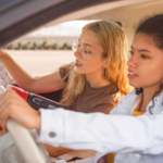 Student choosing the right driving course package in Montreal with a driving instructor